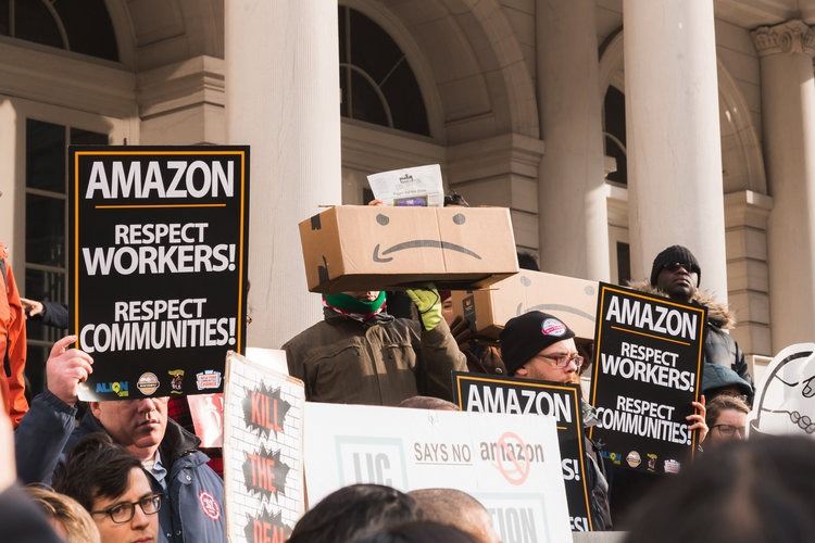 Amazon employees and community protesting poor working conditions in New York