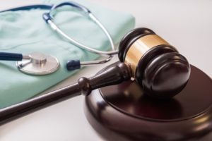 Can I file a malpractice suit without a lawyer
