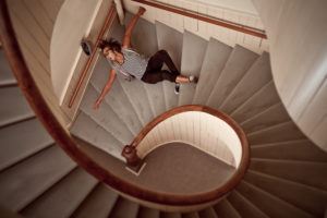 man-falling-down-spiral-staircase