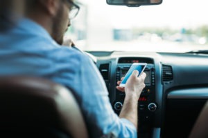 what happens if you are involved in texting and driving accident ny
